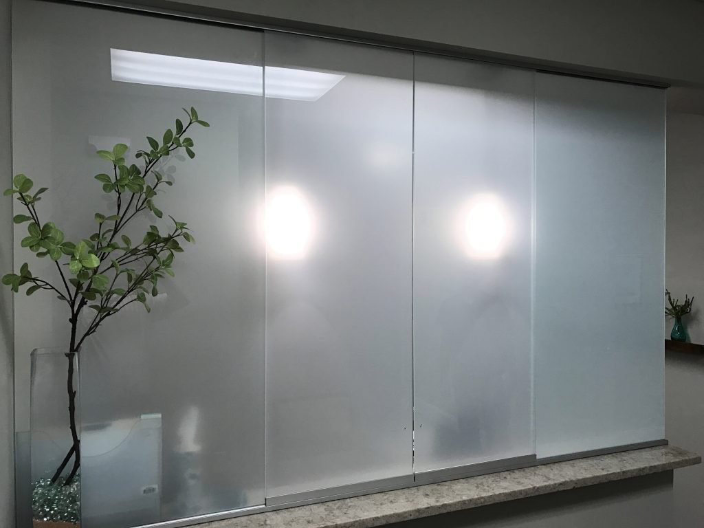 Storefront doors with aluminum frame in strip mall