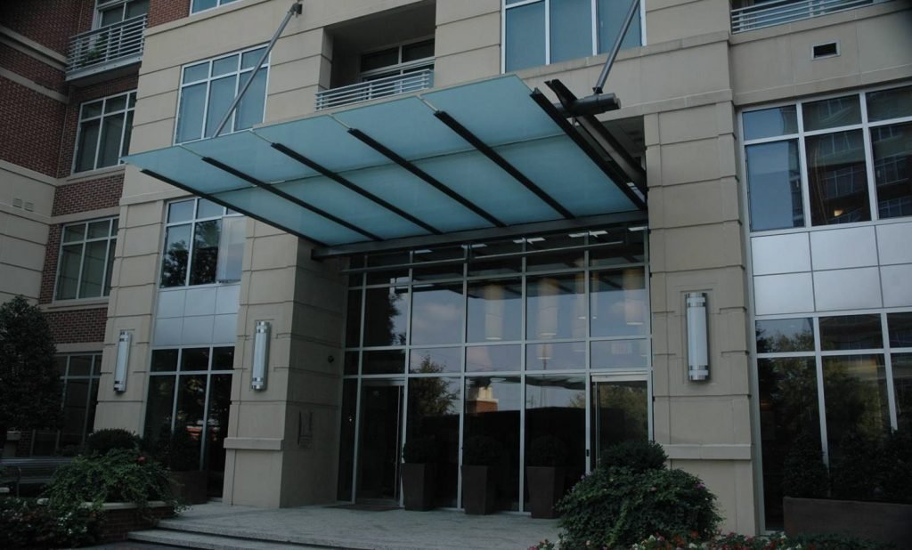 Glass storefront doors with frosted privacy film