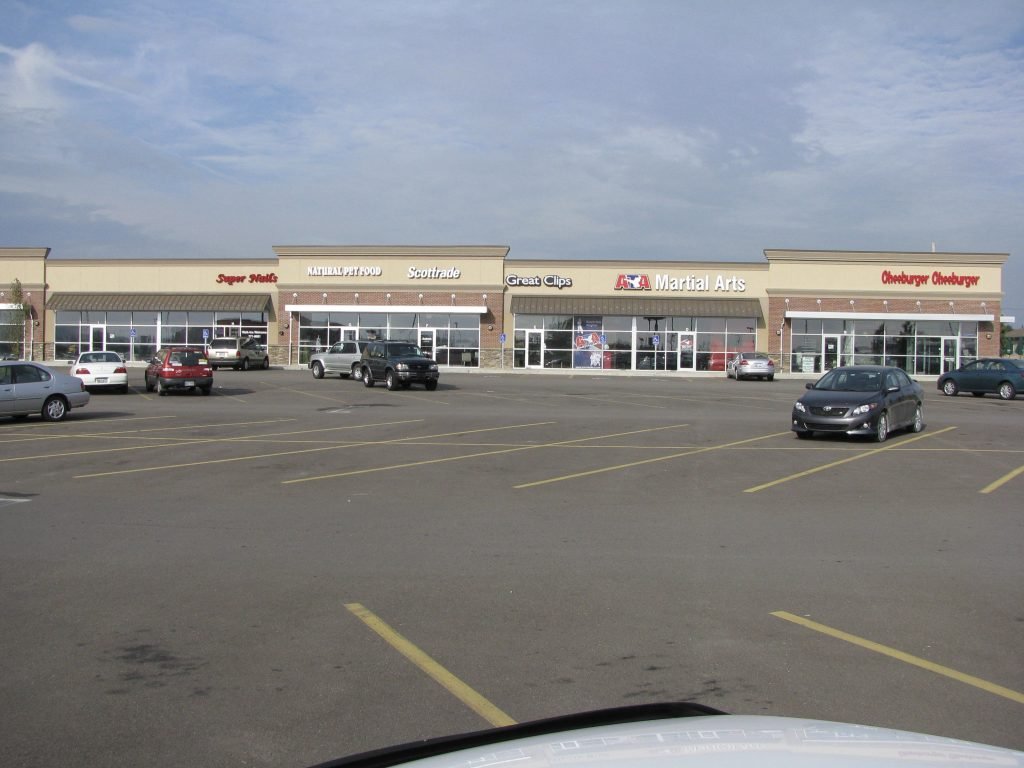 Glass storefront entry doors with framing