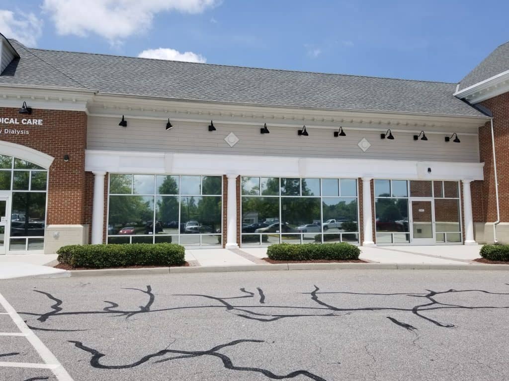 Glass storefront doors with signage space